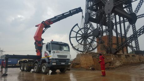 crane truck assisting erect of of structure